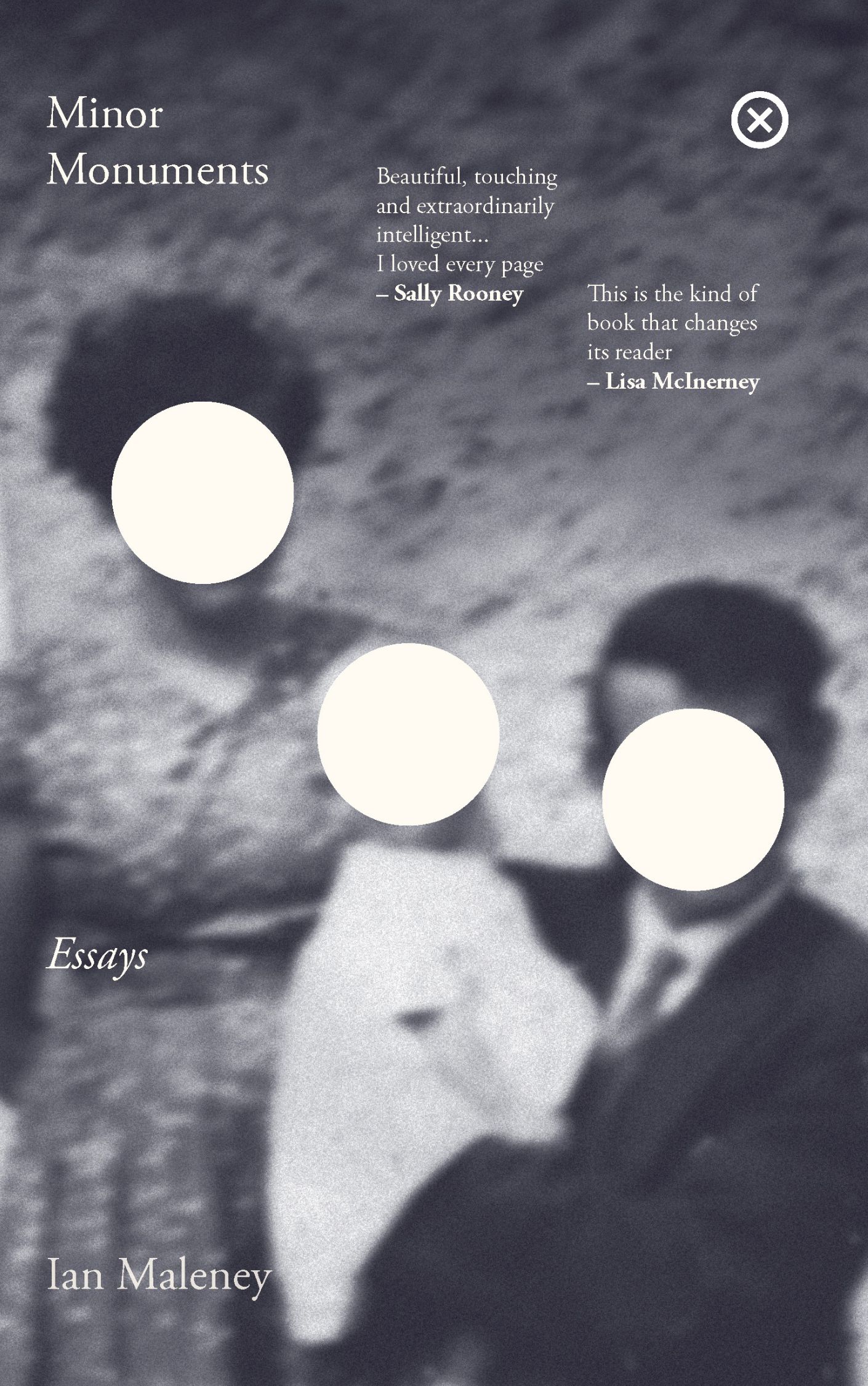 Image of an old photograph of a couple holding a small child. The photo is blurry, and their faces are deliberately obfuscated by clean pale circles. Title of book plus endorsements.